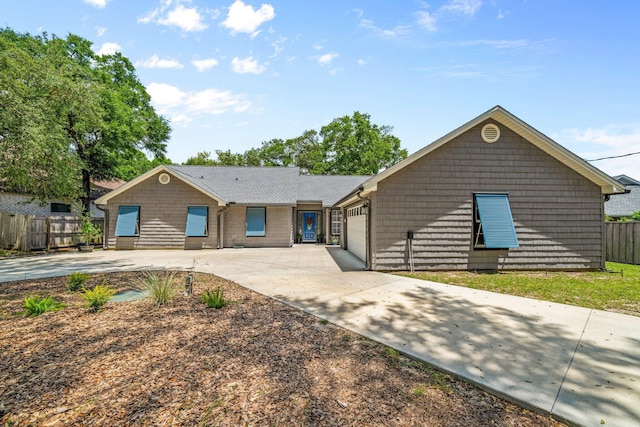 112 Meigs Dr, Shalimar, FL 32579 - ranch-style house featuring concrete driveway and a garage