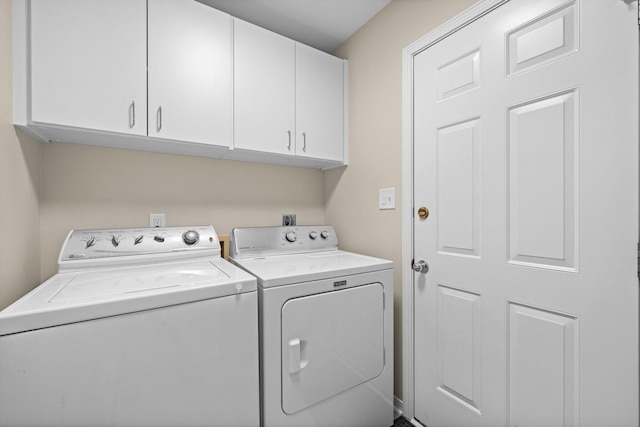 112 Meigs Dr, Shalimar, FL 32579 - laundry area featuring cabinet space and washer and clothes dryer