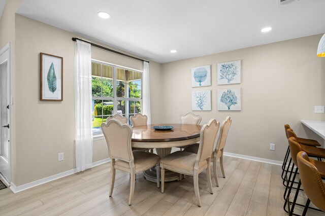 112 Meigs Dr, Shalimar, FL 32579 - dining room with light wood finished floors, baseboards, and recessed lighting