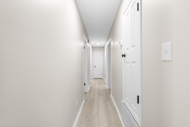 112 Meigs Dr, Shalimar, FL 32579 - corridor featuring light wood-style flooring and baseboards