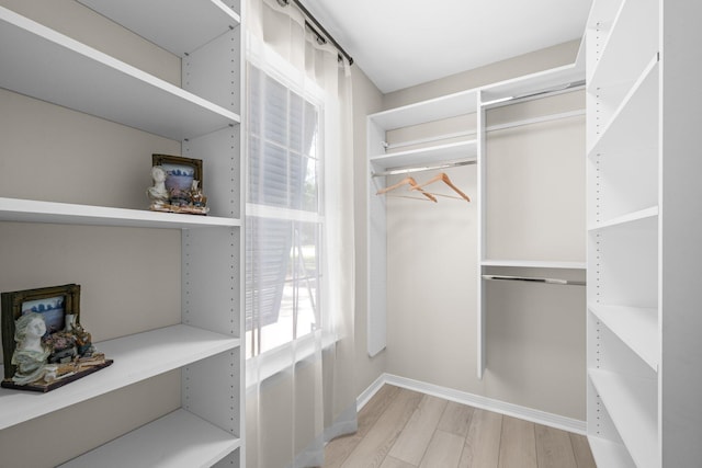 112 Meigs Dr, Shalimar, FL 32579 - walk in closet featuring light wood finished floors