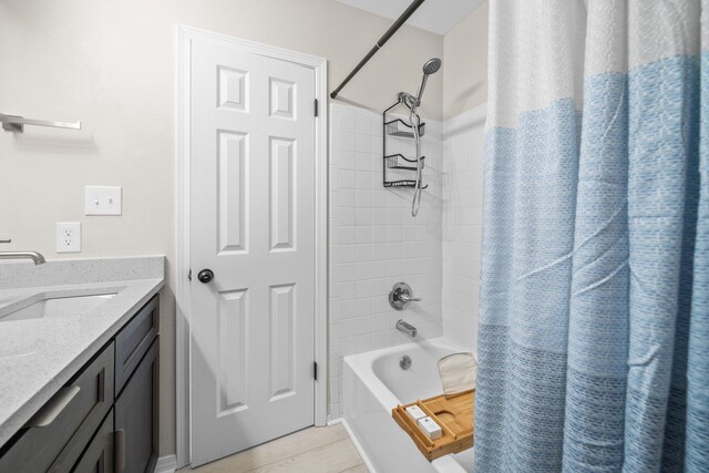 112 Meigs Dr, Shalimar, FL 32579 - bathroom with shower / bathtub combination with curtain, vanity, and wood finished floors