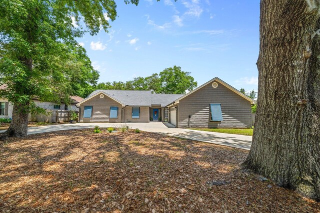 112 Meigs Dr, Shalimar, FL 32579 - view of front facade with driveway and a garage