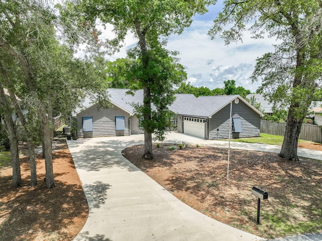 112 Meigs Dr, Shalimar, FL 32579 - single story home with curved driveway and an attached garage