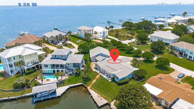 1050 Edgewater Ln, Gulf Breeze, FL 32563 - aerial view of residential area with a nearby body of water and a pool