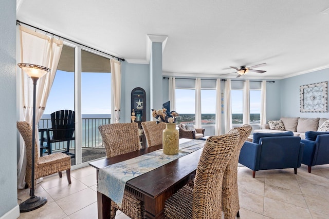 16819 Front Beach Rd Unit 2300, Panama City Beach, FL 32413 - dining space featuring crown molding, a ceiling fan, and light tile patterned floors
