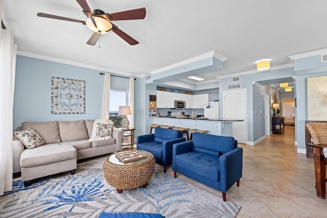 16819 Front Beach Rd Unit 2300, Panama City Beach, FL 32413 - living area featuring a ceiling fan, crown molding, light tile patterned floors, and baseboards