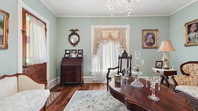 119 E Live Oak Ave, Defuniak Springs, FL 32435 - sitting room with a chandelier, wood finished floors, ornamental molding, and baseboards