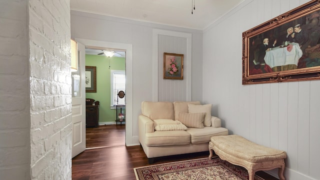 119 E Live Oak Ave, Defuniak Springs, FL 32435 - living room featuring ceiling fan, dark wood-style floors, crown molding, and baseboards