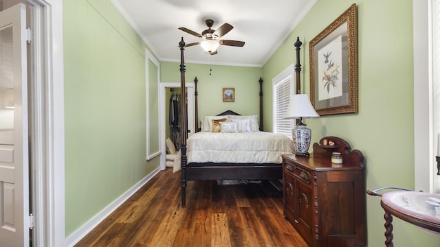119 E Live Oak Ave, Defuniak Springs, FL 32435 - bedroom featuring dark wood-style flooring, ornamental molding, a ceiling fan, baseboards, and ensuite bathroom