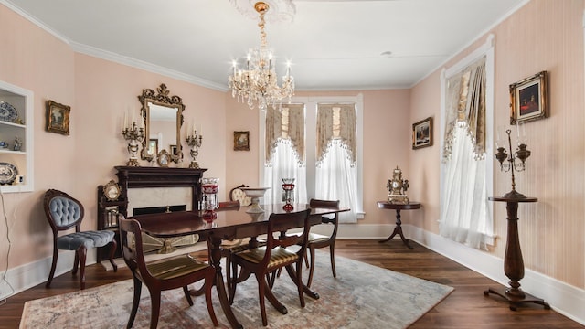 119 E Live Oak Ave, Defuniak Springs, FL 32435 - dining room with a chandelier, ornamental molding, dark wood-style floors, and baseboards