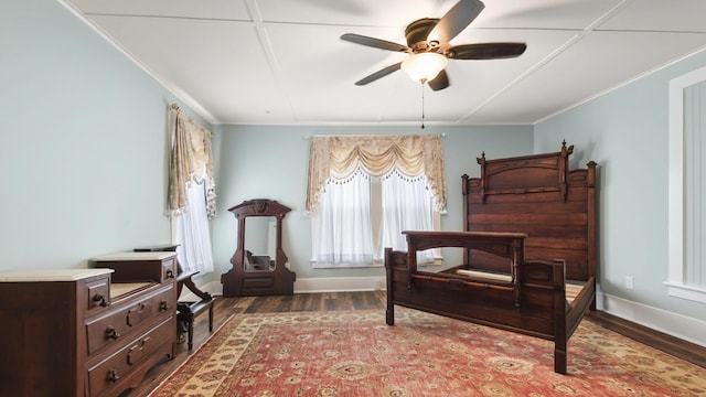 119 E Live Oak Ave, Defuniak Springs, FL 32435 - bedroom with wood finished floors, ornamental molding, baseboards, and ceiling fan