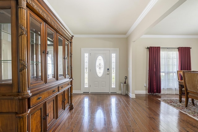 170 Windchime Way, Freeport, FL 32439 - entrance foyer featuring baseboards, dark wood finished floors, and crown molding