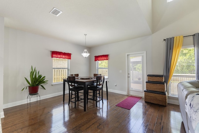 170 Windchime Way, Freeport, FL 32439 - dining room with hardwood / wood-style floors and baseboards