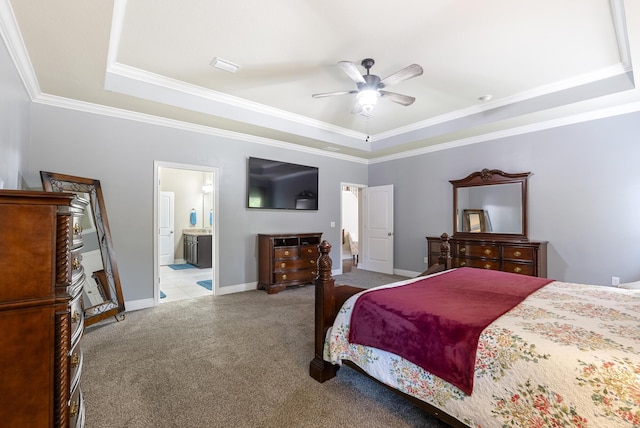 170 Windchime Way, Freeport, FL 32439 - carpeted bedroom featuring a tray ceiling, ornamental molding, baseboards, and a ceiling fan