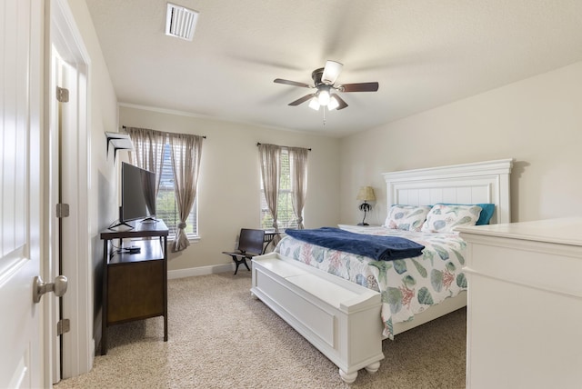 170 Windchime Way, Freeport, FL 32439 - bedroom featuring light colored carpet, baseboards, and a ceiling fan