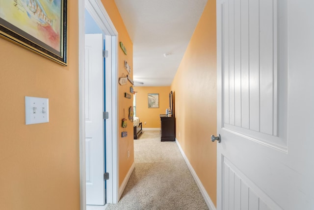 170 Windchime Way, Freeport, FL 32439 - corridor with light carpet and baseboards