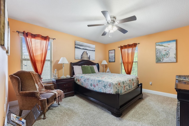 170 Windchime Way, Freeport, FL 32439 - carpeted bedroom featuring baseboards and ceiling fan
