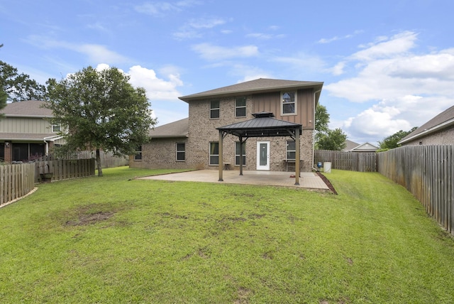 170 Windchime Way, Freeport, FL 32439 - rear view of house featuring a gazebo, a patio area, board and batten siding, and brick siding