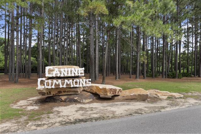 170 Windchime Way, Freeport, FL 32439 - community / neighborhood sign with a forest view