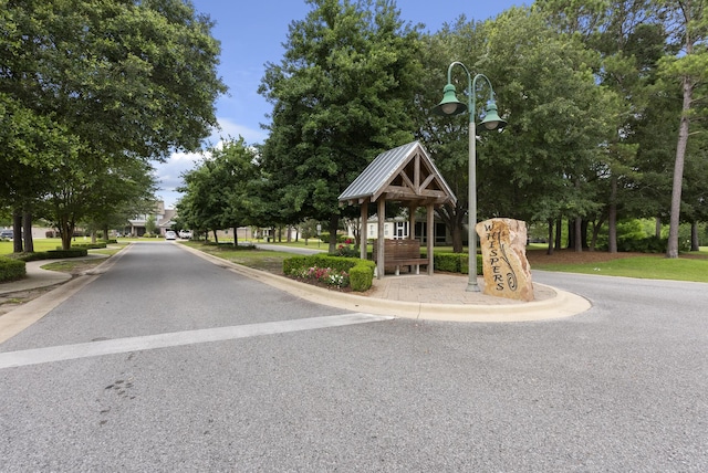 170 Windchime Way, Freeport, FL 32439 - view of asphalt street featuring street lights and curbs