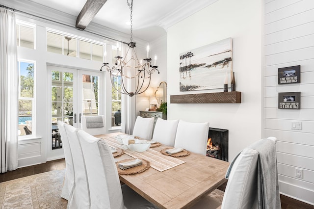 667 E Royal Fern Way, Santa Rosa Beach, FL 32459 - dining room with a chandelier, ornamental molding, wood finished floors, french doors, and beam ceiling