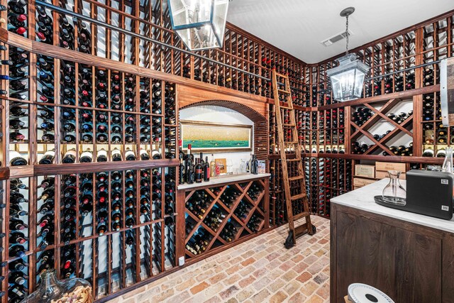 667 E Royal Fern Way, Santa Rosa Beach, FL 32459 - wine area featuring brick flooring