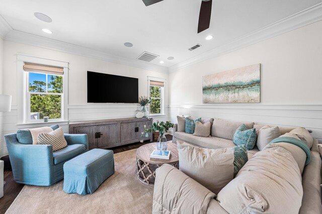 667 E Royal Fern Way, Santa Rosa Beach, FL 32459 - living room with wood finished floors, healthy amount of natural light, crown molding, recessed lighting, and a wainscoted wall