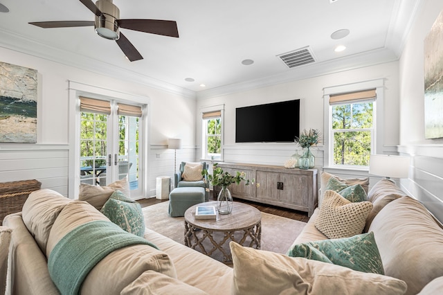 667 E Royal Fern Way, Santa Rosa Beach, FL 32459 - living area featuring wood finished floors, crown molding, ceiling fan, a wainscoted wall, and recessed lighting