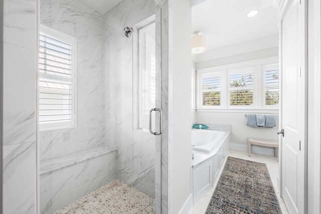 667 E Royal Fern Way, Santa Rosa Beach, FL 32459 - bathroom featuring a marble finish shower, a bath, ornamental molding, and baseboards