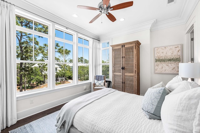 667 E Royal Fern Way, Santa Rosa Beach, FL 32459 - bedroom featuring crown molding, baseboards, wood finished floors, a closet, and recessed lighting