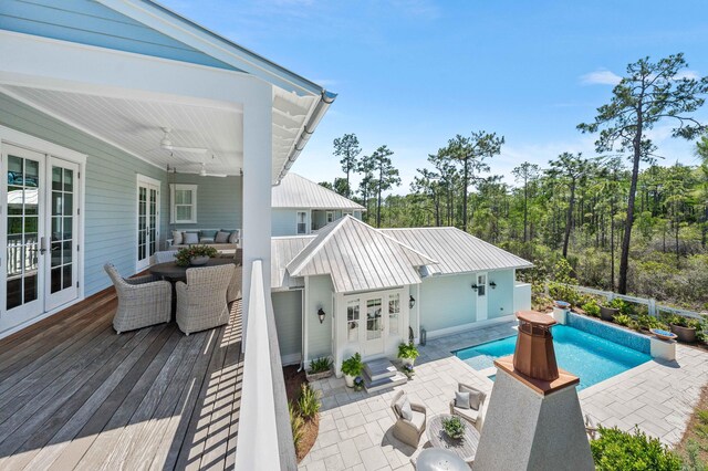 667 E Royal Fern Way, Santa Rosa Beach, FL 32459 - outdoor pool featuring french doors, outdoor dining area, and a patio