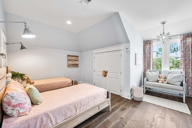 667 E Royal Fern Way, Santa Rosa Beach, FL 32459 - bedroom featuring wood finished floors, vaulted ceiling, recessed lighting, and baseboards