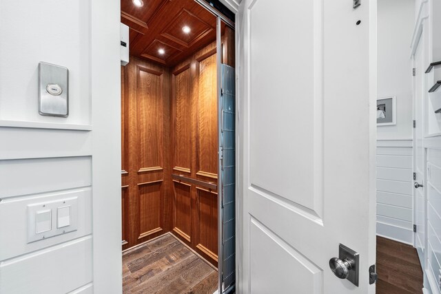667 E Royal Fern Way, Santa Rosa Beach, FL 32459 - elevator featuring wood finished floors, recessed lighting, wooden ceiling, and wood walls