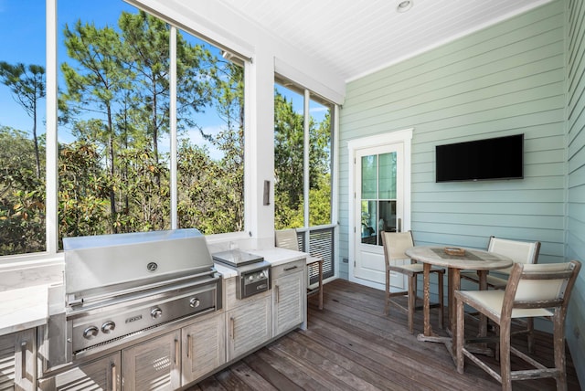 667 E Royal Fern Way, Santa Rosa Beach, FL 32459 - sunroom with plenty of natural light and outdoor dining area