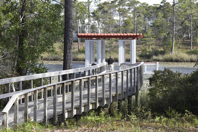 667 E Royal Fern Way, Santa Rosa Beach, FL 32459 - wooden terrace with view of wooded area