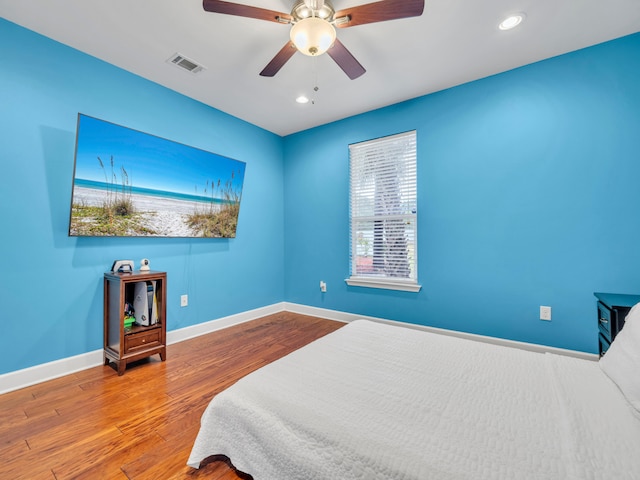 311 Beal Pkwy, Fort Walton Beach, FL 32548 - bedroom featuring wood finished floors, baseboards, recessed lighting, and a ceiling fan