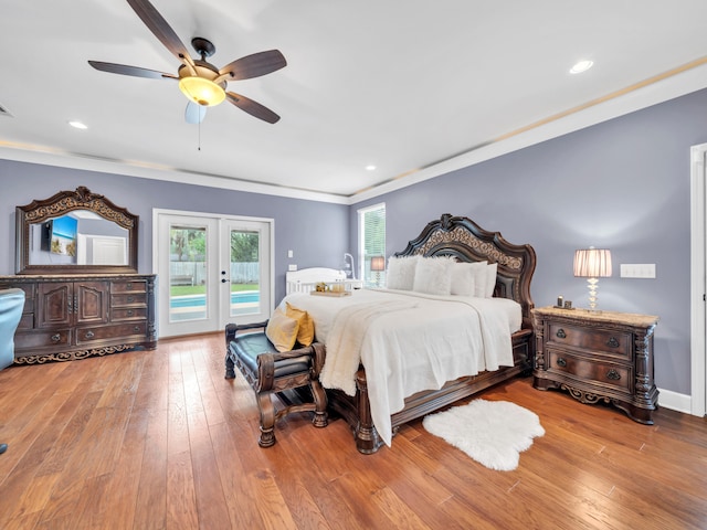 311 Beal Pkwy, Fort Walton Beach, FL 32548 - bedroom with access to exterior, french doors, hardwood / wood-style flooring, a ceiling fan, and ornamental molding