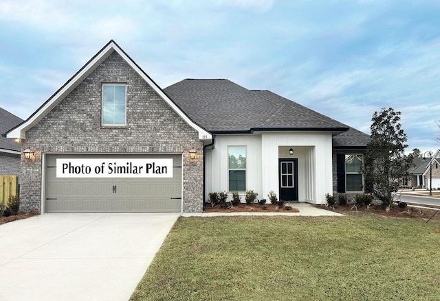 2733 Louis Cir, Crestview, FL 32536 - view of front of property with a front lawn, roof with shingles, driveway, a garage, and brick siding
