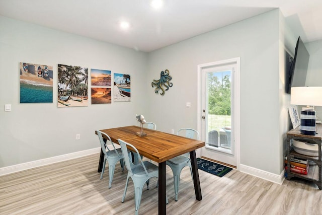 718 Backwater Rd, Port St Joe, FL 32456 - dining area featuring light wood-style floors, baseboards, and recessed lighting