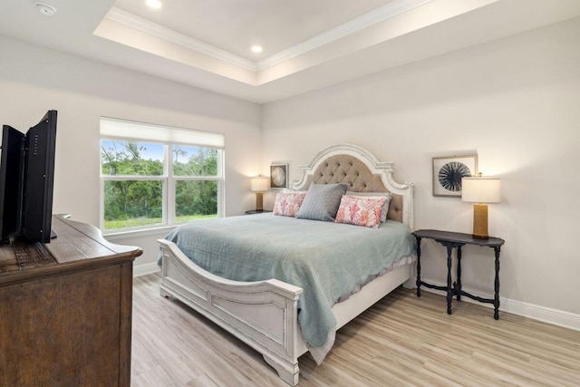 718 Backwater Rd, Port St Joe, FL 32456 - bedroom featuring ornamental molding, wood finished floors, baseboards, a raised ceiling, and recessed lighting