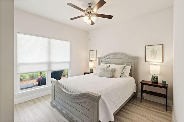 718 Backwater Rd, Port St Joe, FL 32456 - bedroom featuring wood finished floors, baseboards, and ceiling fan