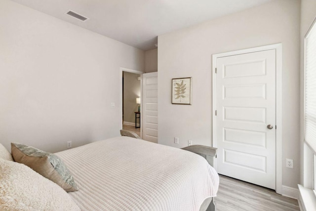 718 Backwater Rd, Port St Joe, FL 32456 - bedroom with light wood-style floors