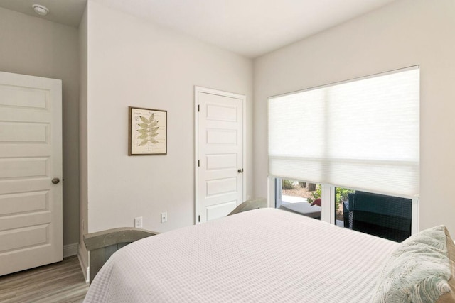 718 Backwater Rd, Port St Joe, FL 32456 - bedroom with wood finished floors and baseboards