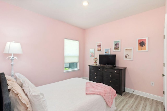 718 Backwater Rd, Port St Joe, FL 32456 - bedroom with light wood-style flooring, baseboards, and recessed lighting