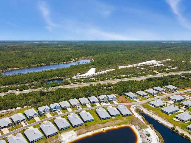 718 Backwater Rd, Port St Joe, FL 32456 - aerial view of residential area featuring a heavily wooded area and a large body of water