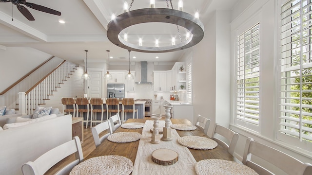 51 W Okeechobee, Santa Rosa Beach, FL 32459 - dining area featuring wood finished floors, stairway, a ceiling fan, recessed lighting, and beam ceiling