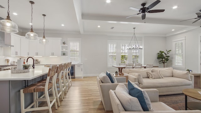51 W Okeechobee, Santa Rosa Beach, FL 32459 - living room with ceiling fan, light wood finished floors, recessed lighting, baseboards, and ornamental molding