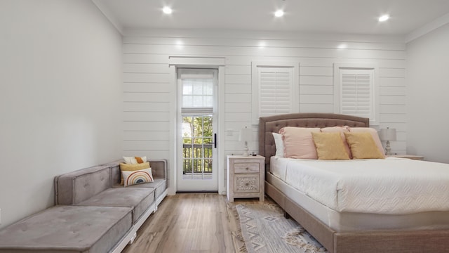 51 W Okeechobee, Santa Rosa Beach, FL 32459 - bedroom with ornamental molding, light wood finished floors, and access to exterior
