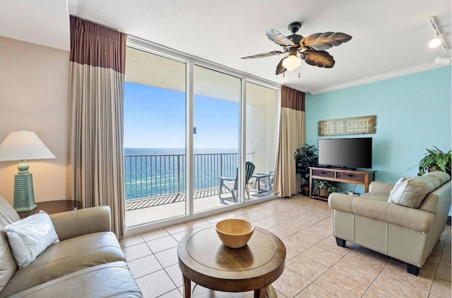 16819 Front Beach Rd Unit 1514, Panama City Beach, FL 32413 - living room with floor to ceiling windows, a ceiling fan, light tile patterned flooring, and crown molding